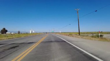 Güney Kaliforniya Kamyon Durağı 5 ve 58. Otoyol 03 Buttonwillow ABD 'nin Ön Görünüm Sürücü Plakaları