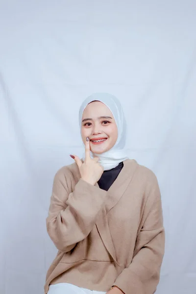 Asian woman wearing hijab with make up and fresh face. Fresh clean skin. Facial treatments, Facial treatments, Cosmetology and beauty.