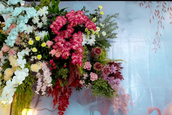 flower arrangements as a backdrop for wedding celebrations in Indonesia. Wedding decorations. Wedding backdrop with flowers and Indonesian wedding decorations.