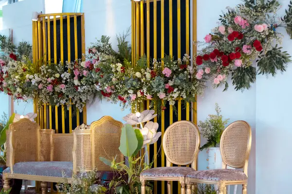 flower arrangements as a backdrop for wedding celebrations in Indonesia. Wedding decorations. Wedding backdrop with flowers and Indonesian wedding decorations.