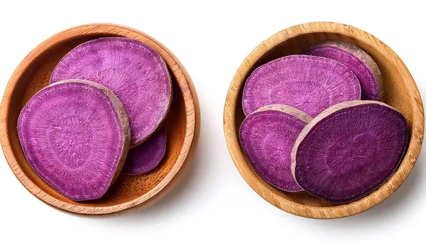 stock image Purple sweet yam slice in wooden bowl isolated on white background