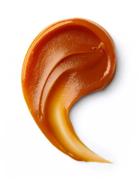 stock image Smear of tasty caramel paste on white background