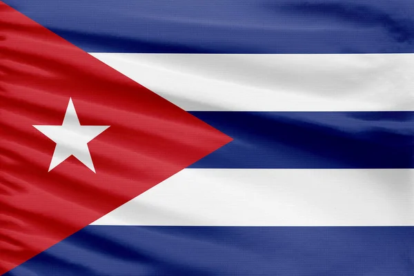 キューバの旗は折り目が付いているスポーツのステッチの布の生地に描かれています — ストック写真