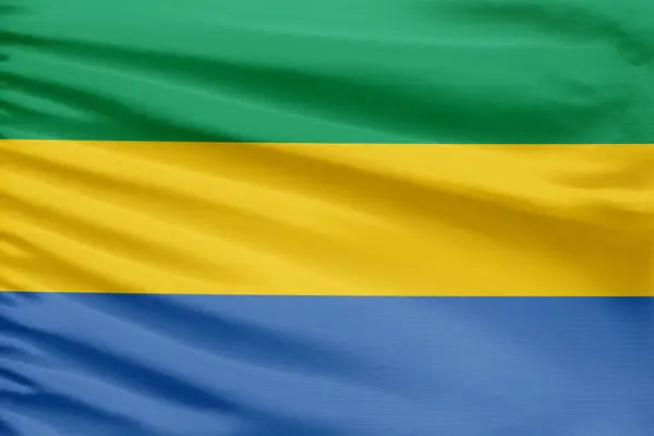 Vlajka Gabonu Vyobrazena Sportovní Látce Záhyby — Stock fotografie