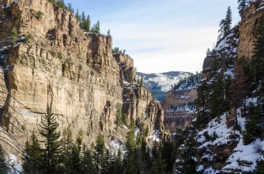 Snowy Steep cliffs of Glenwood Canyon, Colorado, USA. clipart