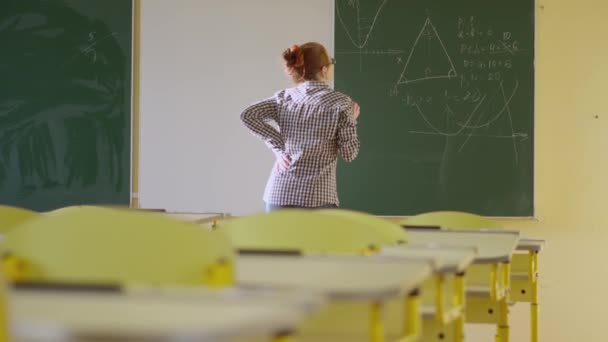 Girl Student Writes Green Board Female Teacher School Board Hand — Stockvideo