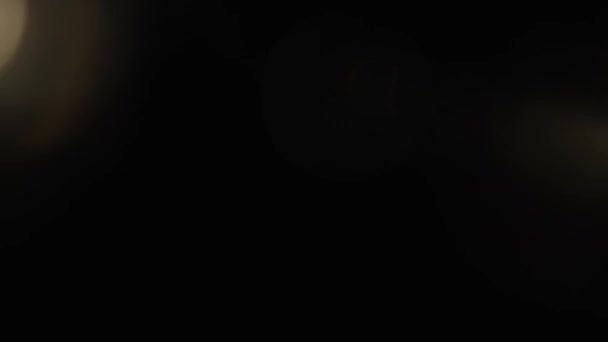光渗透在黑色浴池上的框架中 光渗透在黑色背景上的框架中 演播室镜头照明弹自然光灯照射Bokeh效果 用于制作视频 视频样式 — 图库视频影像