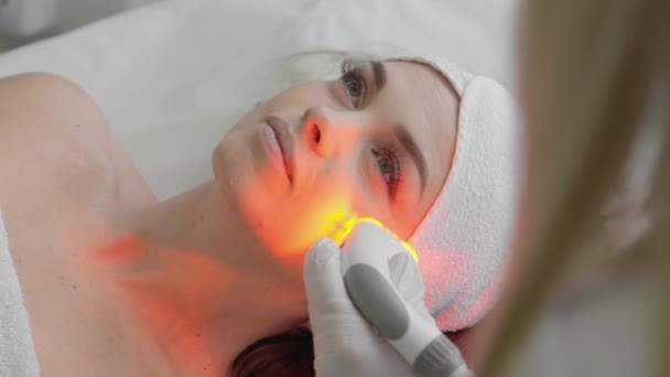 Red Led Treatment Woman Doing Facial Skin Therapy Radiofrequency Face — Vídeo de Stock