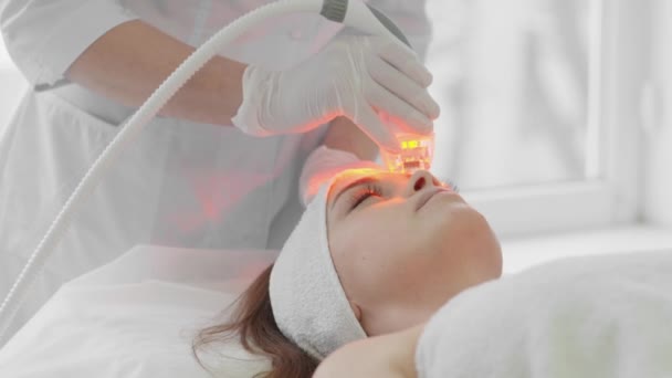 Red Led Treatment Woman Doing Facial Skin Therapy Radiofrequency Face — Stock video