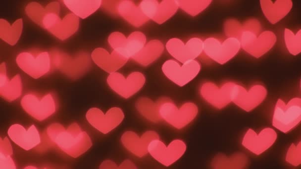 多くの赤い心 概念多くの赤い心 コンセプト バレンタインデー 記念日 母の日 電子カードの招待状 暗い光 カラフルな心のアニメーション カメラの動き — ストック動画