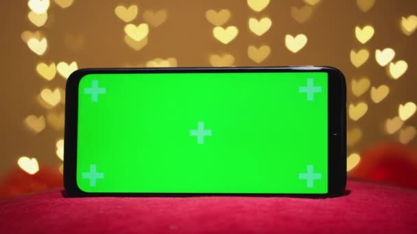 Green Screen Smartphone Chroma Key Valentines Day Red Background Defocused — Vídeos de Stock