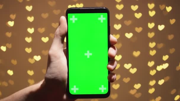 Green Screen Smartphone Chroma Key Valentines Day Red Background Defocused — Vídeo de Stock