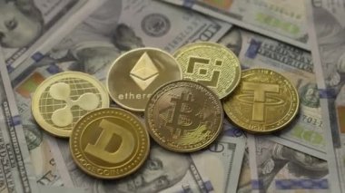 Cryptocurrency virtual money Bitcoin BTC and US dollar banknotes. Crypto exchange trading. Digital financial transactions blockchain. Business investment Ethereum, Tether, Binance USD, XRP, Dogecoin.