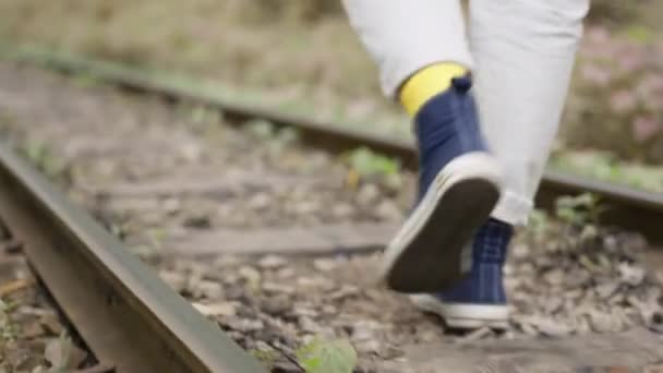 Woman Walks Sneakers Sleepers Railway Track Close Camera Walk Forest — Stock Video