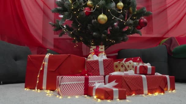 Touching Christmas Moment Christmas Tree Wrapped Lights Freed Gift Curtains — Stock Video