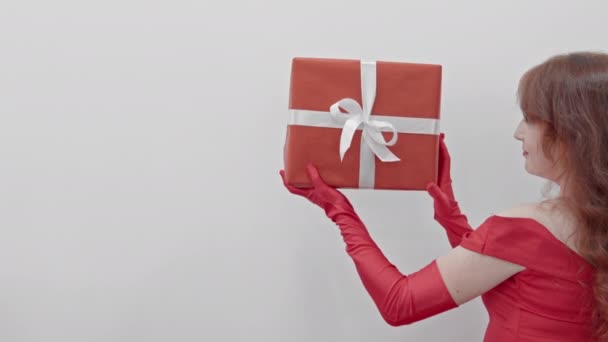 Magical Moment Woman Holds Mysterious Gift Bag White Background Gives — Stock Video