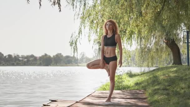 Woman Enjoys Peace Quiet Her Immersing Herself Yogic Meditation Lake — Stock Video