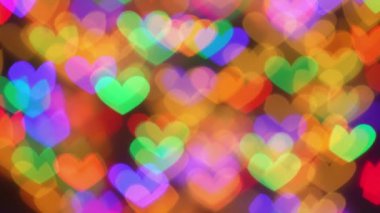 Canlı kalp şekilli Bokeh ışıkları güzel bir romantik atmosfer yaratır. Sevgililer Günü 'nde kutlanan sevgi ve sevginin özünü mükemmel bir şekilde somutlaştırır.