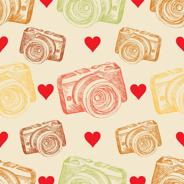 Seamless pattern with hand drawn retro camera. Vector illustration.