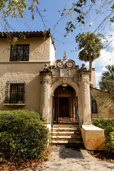 stairs near entrance door of Mediterranean style house in Miami 