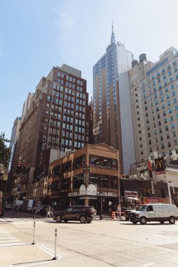 NEW YORK, USA - OCTOBER 13, 2022: McDonalds and Taco Bell restaurants on corner of crossroads in Manhattan