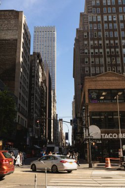 NEW YORK, USA - OCTOBER 11, 2022: People and transport on street in Manhattan 