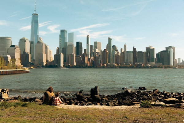 NEW YORK, USA - OCTOBER 11, 2022: World Trade Center and Hudson river at daytime 