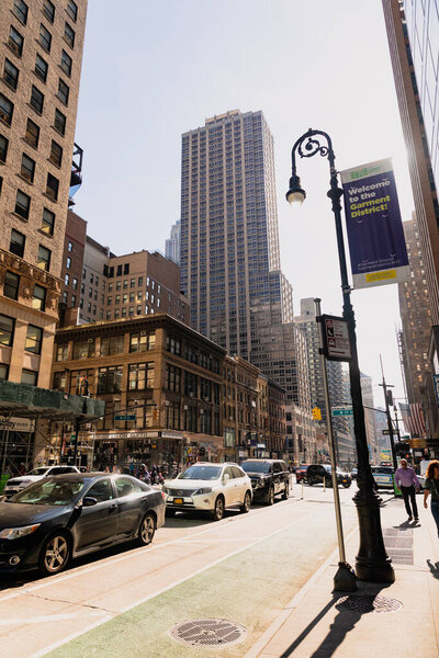 NEW YORK, USA - OCTOBER 11, 2022: Transport on road on urban street at daytime 