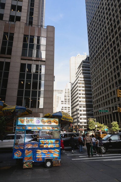 NEW YORK, USA - OCTOBER 11, 2022: Food cart on road on urban street in Manhattan 