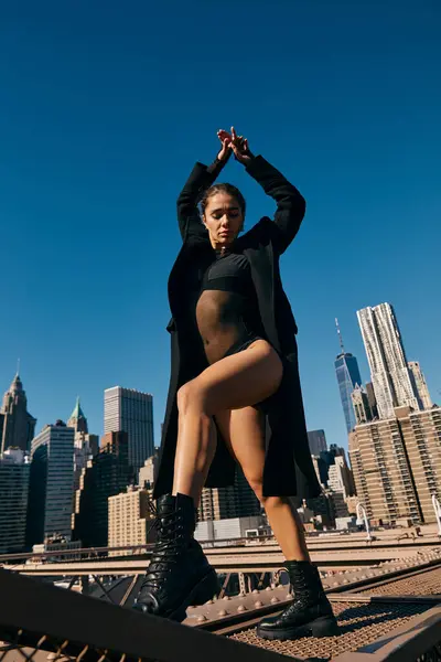 stock image A young woman dances on the streets of New York City.