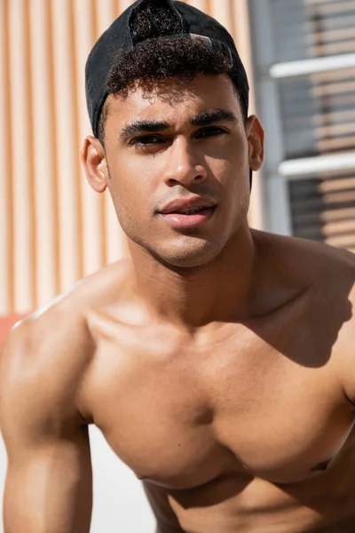 Portrait of confident sexy young cuban man with athletic body on  street in Miami, south beach — Stock Photo