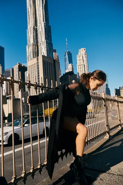 A young woman dances on the streets of New York City. — Stock Photo