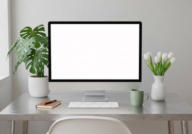 Minimalist ev ofisi, içi boş ekranlı bir bilgisayar, taze çiçekler, saksı bitkisi ve yaratıcılar için kırtasiye malzemeleriyle tamamlanmış..