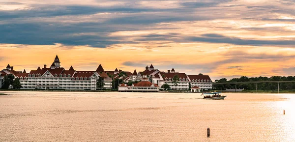 view of houses with red roofs at sunset