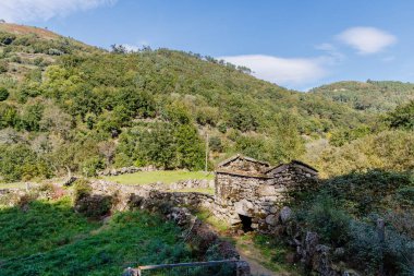 small stone construction in the Geres valley near Sistelo, Viana do Castelo, Portugal on an autumn day clipart