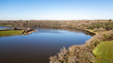 Lac du Jaunay aerial view by drone at Chapelle-Hermier, France on a sunny winter day clipart