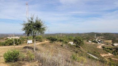 View of the highest point in the Eastern Algarve, Alcaria do Cume, 525 meters above sea level. Near Santa Catarina da Fonte do Bispo, Tavira, Portugal on an autumn day clipart