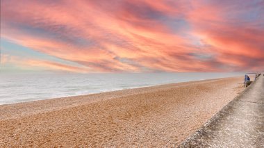 Sandgate pebble beach, near Folkestone, England on a winter day clipart