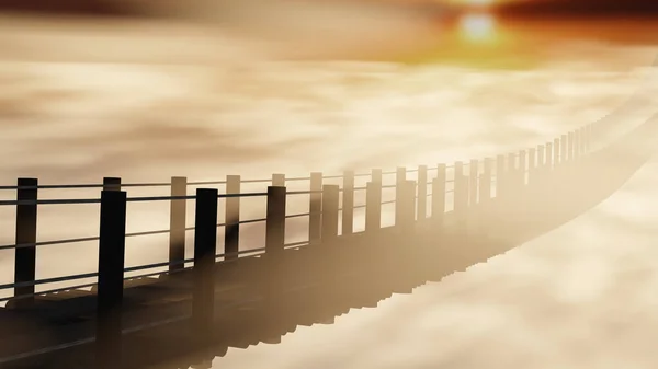 Güneş sisli bir sabahta ahşap asma köprünün üzerinden yükseliyor.)