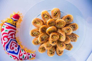 Ramadan Oriental dessert food photography, Photo is selective focus with shallow depth of field. Taken at Cairo Egypt clipart