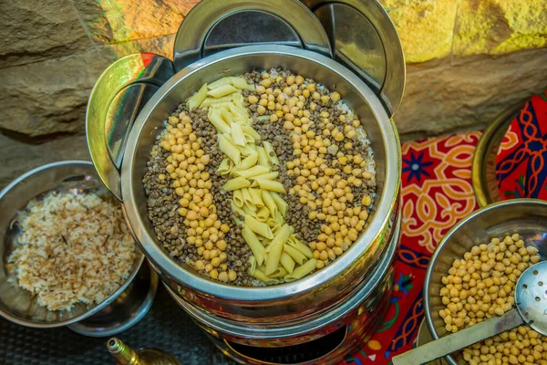 Ramadan Oriental Egyptian food photography, Koshary, eat in breakfast or lunch or dinner. Photo is selective focus with shallow depth of field. Taken at Cairo Egypt