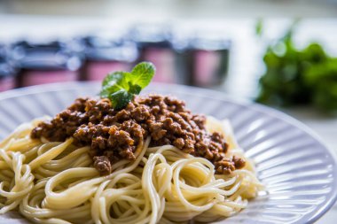 Pasta food shot with and without sauce, shot is selective focus with shallow depth of field. Photo taken at Cairo Egypt