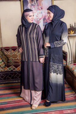 Editorial fashion photography, Abaya wear shooting, islamic dressing, veiled woman, shot is selective focus with shallow depth of field, taken at Cairo Egypt on 27 February 2018 clipart