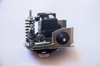 Su pompası için otomatik denetim baskılayıcı, arka planda otomatik su motoru, çekim sığ alan derinliği ile seçici odak