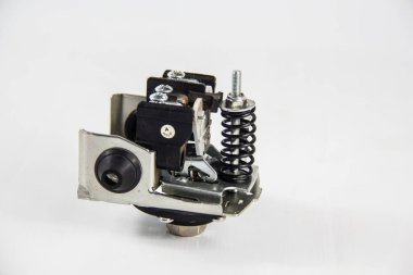 Su pompası için otomatik denetim baskılayıcı, arka planda otomatik su motoru, çekim sığ alan derinliği ile seçici odak