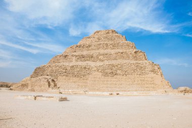 Archeology photo, Saqqara contains the oldest complete stone building complex known in history, the Pyramid of Djoser built during third Dynasty, selective focus, shallow depth of field. Cairo Egypt clipart