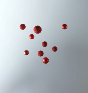 Pastel gri arka planda kırmızı takılar. En küçük üst viwe konsepti.