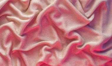 Pürüzsüz altın rengi ipek ya da parlak lüks kumaş dokusu soyut bir arkaplan olarak kullanılabilir. Lüks arkaplan tasarımı.