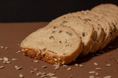 Toptan un ve çekirdekten ekmek, ayçiçeği, keten, susam. Yaratıcı gıda fikri, arka plan dokusu