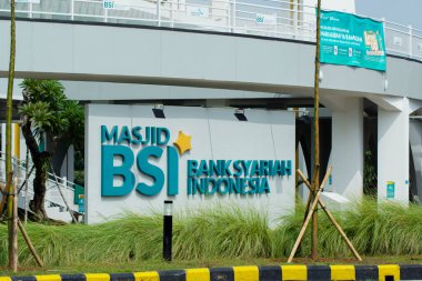 Bakauheni - April 24th, 2024: Nameplate of the BSI - Bank Syariah Indonesia (Indonesian Sharia Bank) mosque in Bakauheni, Lampung clipart